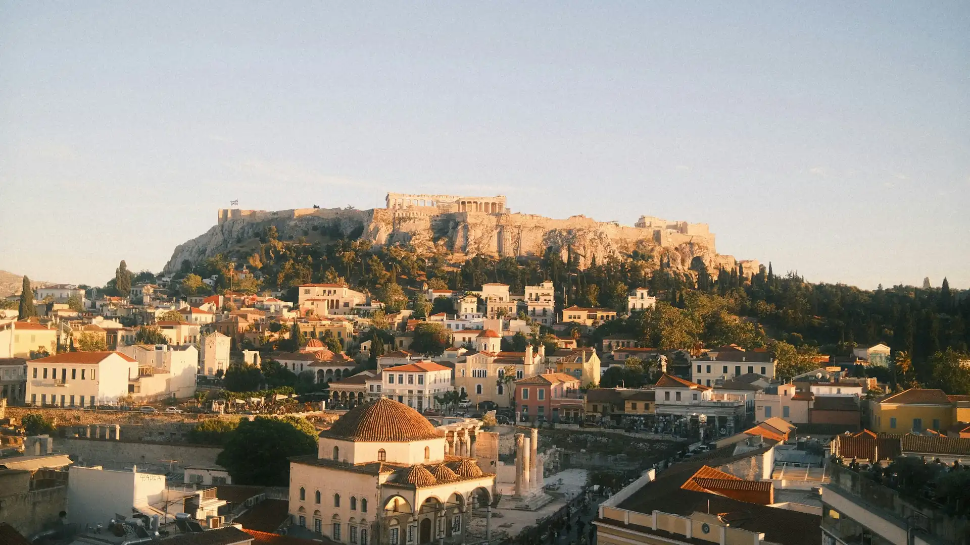The Acropolis overlooking Athens in warm evening light